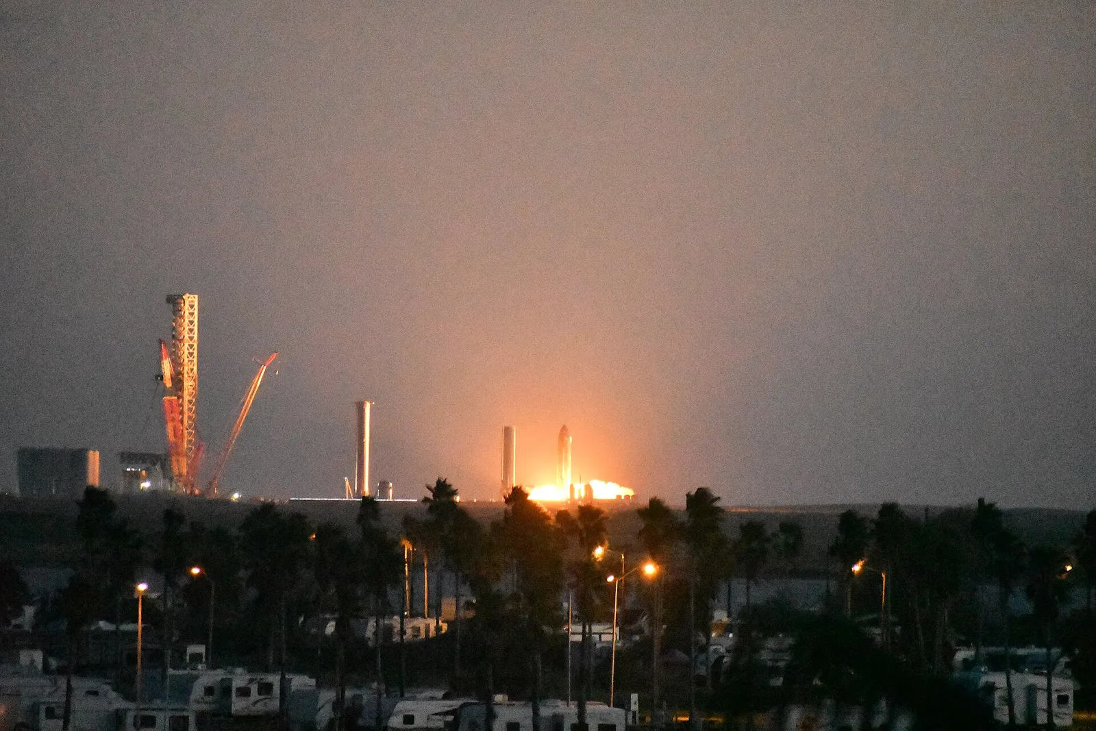 A SpaceX Starship prototype firing its engines during a static-fire test