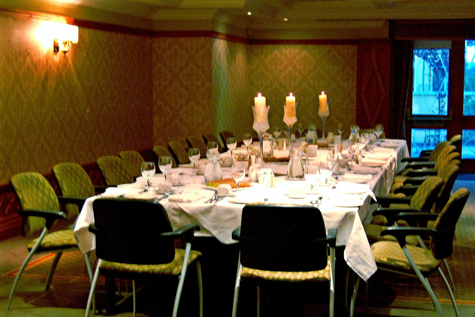 A table set for a wedding reception dinner