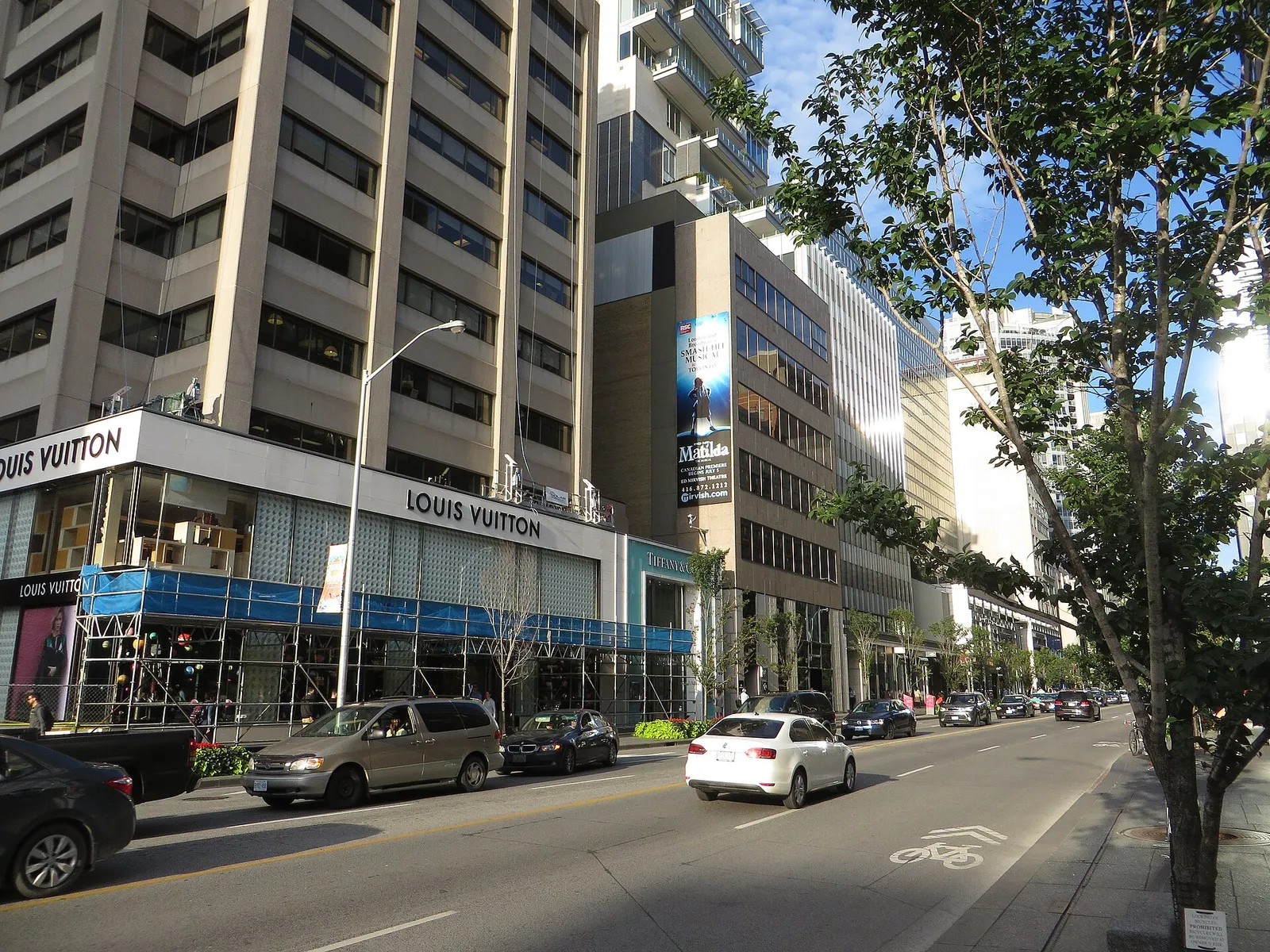 Shoppers on a high-end retail street