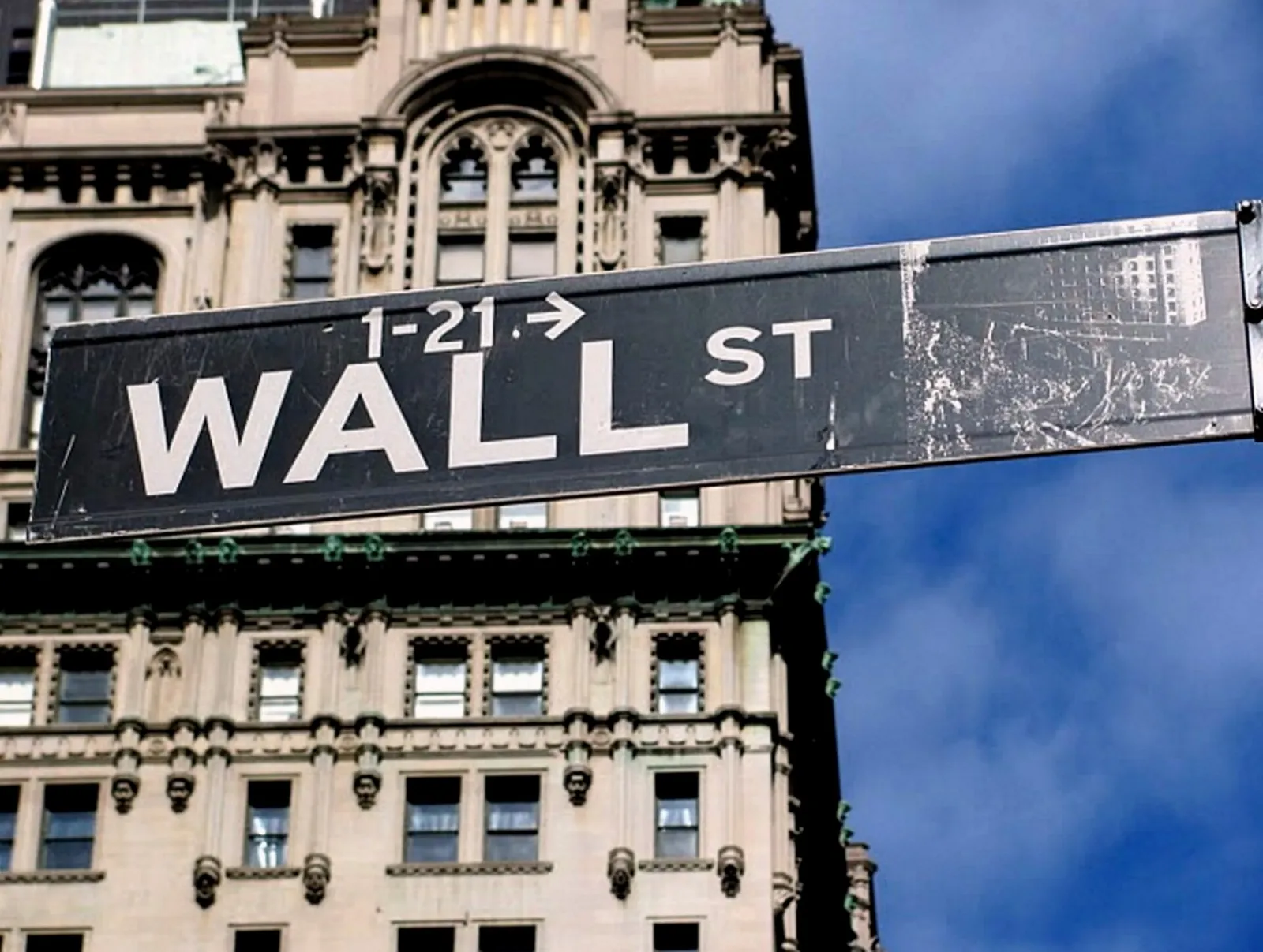 A street sign at the corner of Broadway and Wall Street in lower Manhattan