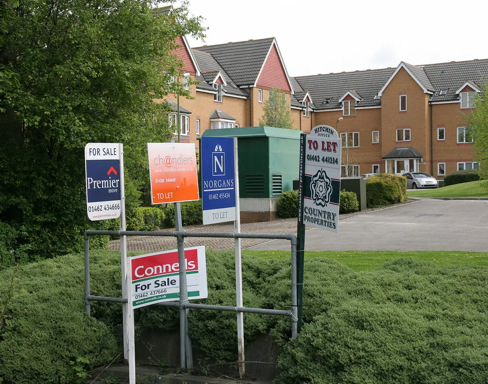 Houses with 'for sale' signs