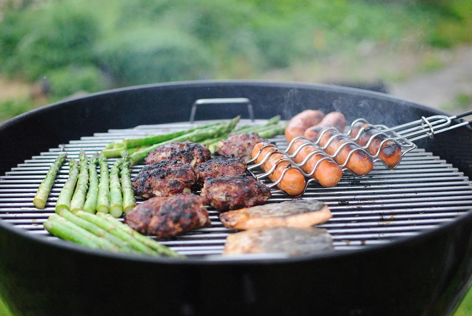 Food cooking on a barbecue grill