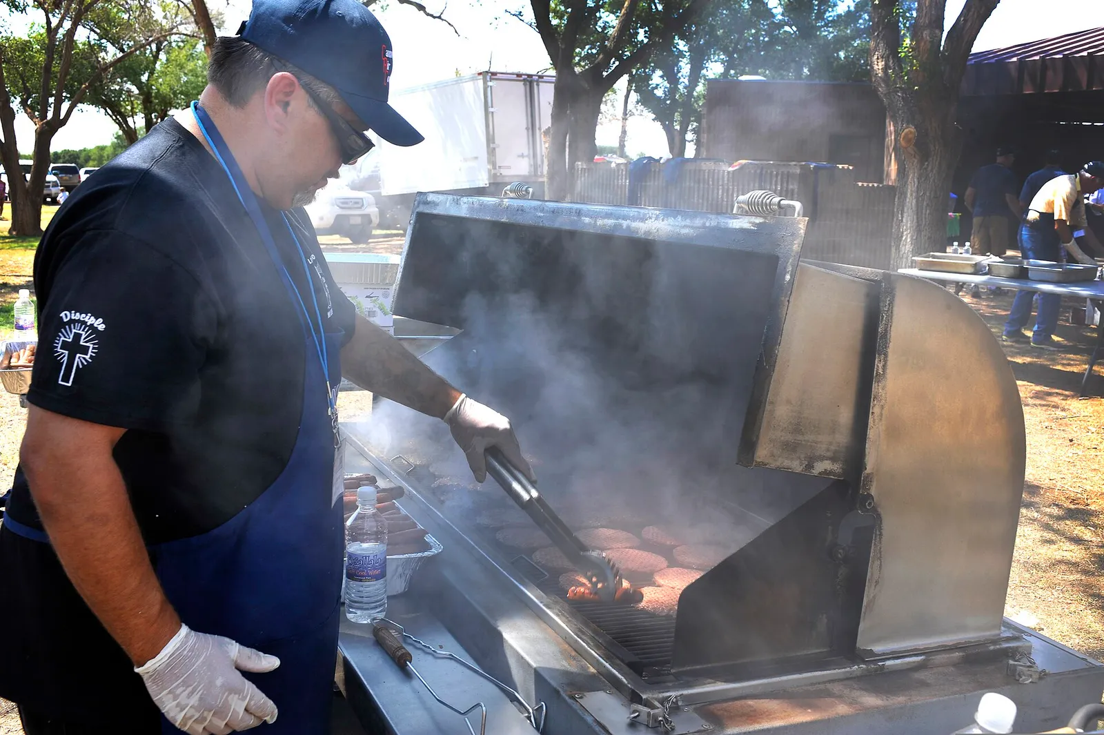Hamburgers cooking on a grill
