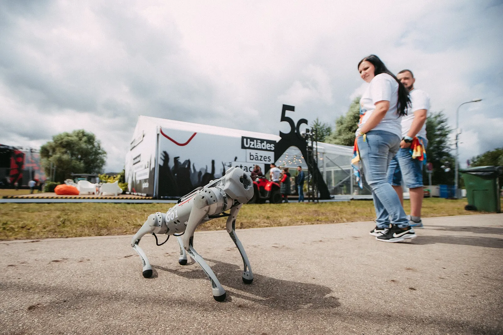 A Unitree robot walking at a technology event