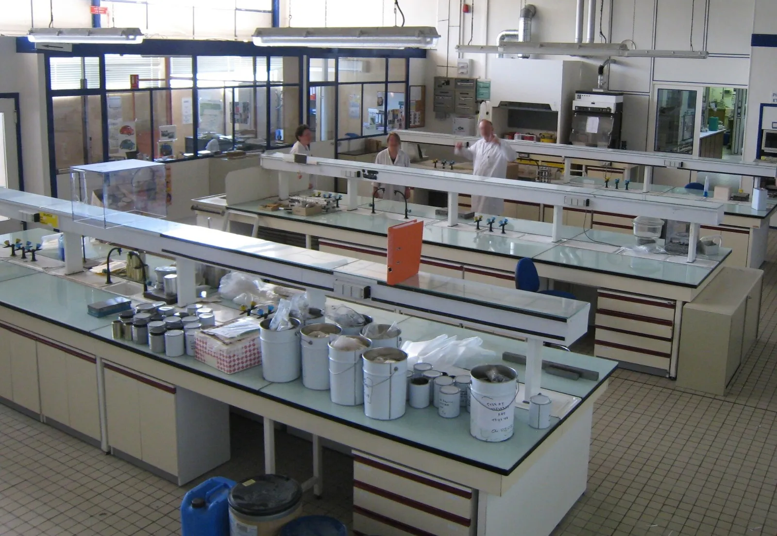 A chemistry laboratory with benches and glassware