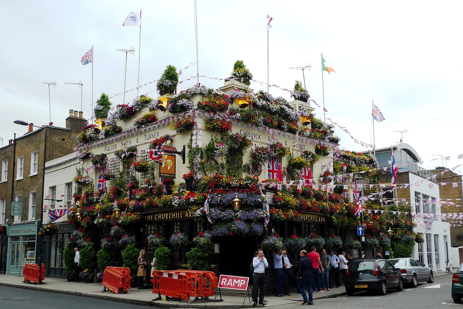 A traditional London pub decorated with flowers