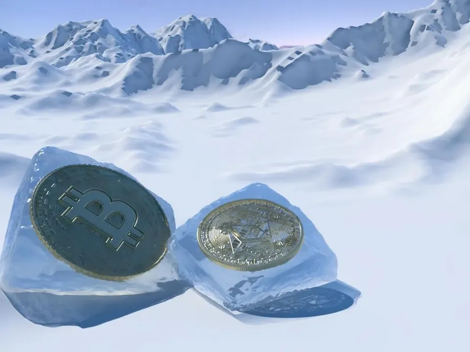 Cryptocurrency coins frozen in ice, evoking a crypto downturn