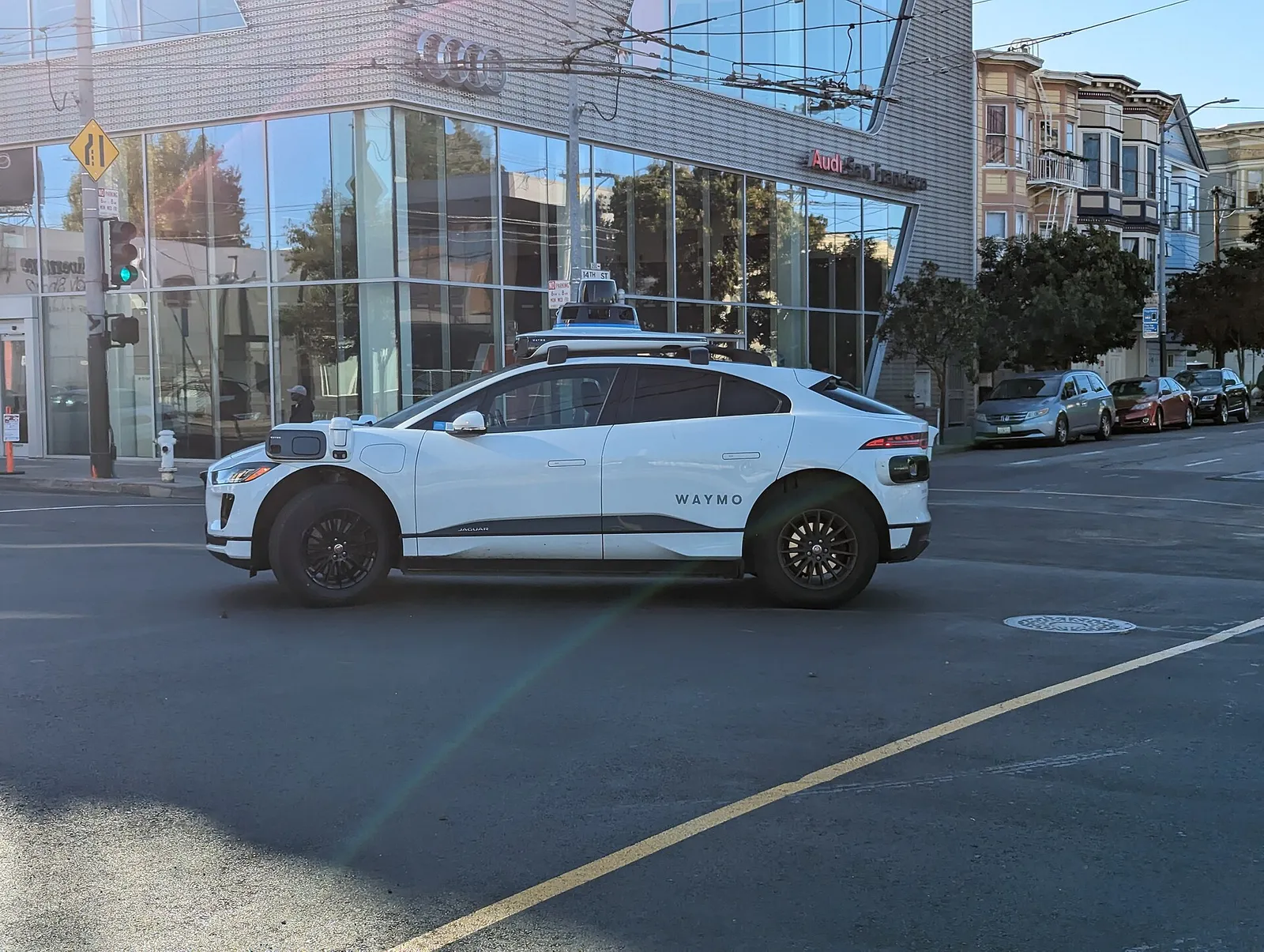 Waymo robotaxis on a street in San Francisco