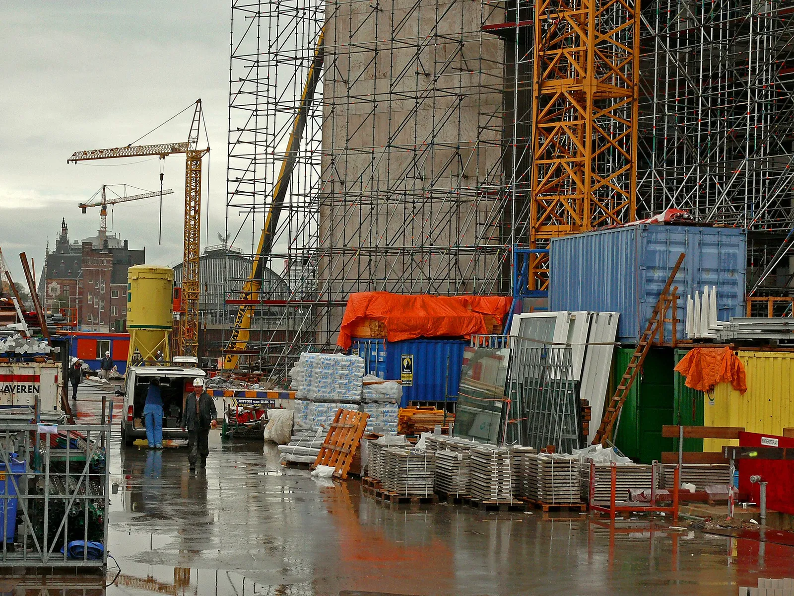 Scaffolding and cranes over a large construction site at the Oosterdokseiland in central Amsterdam