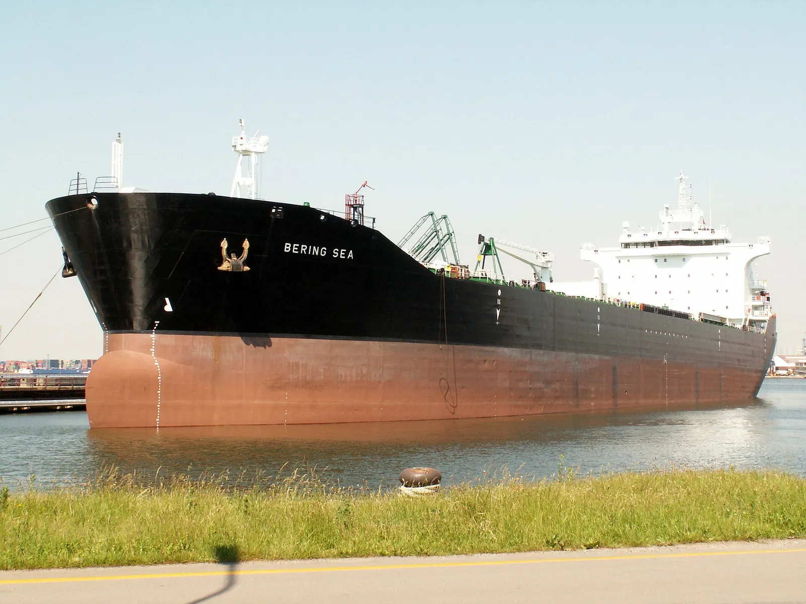 An oil tanker docked at a port