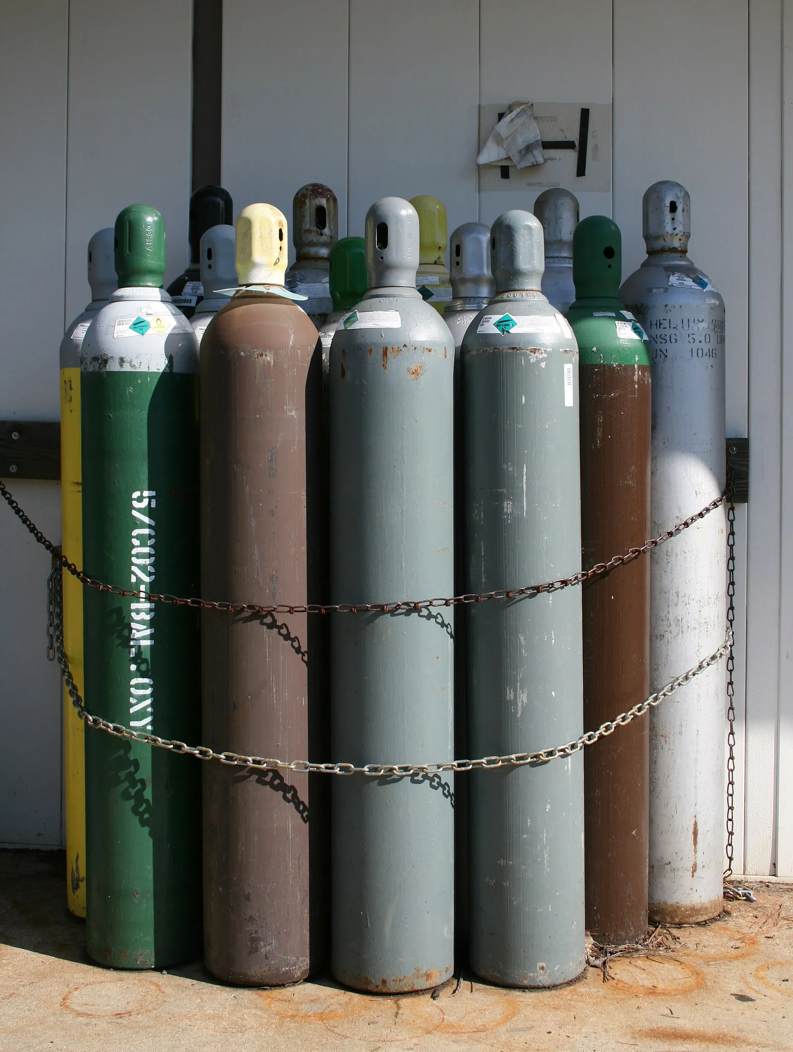 A bundle of compressed gas cylinders