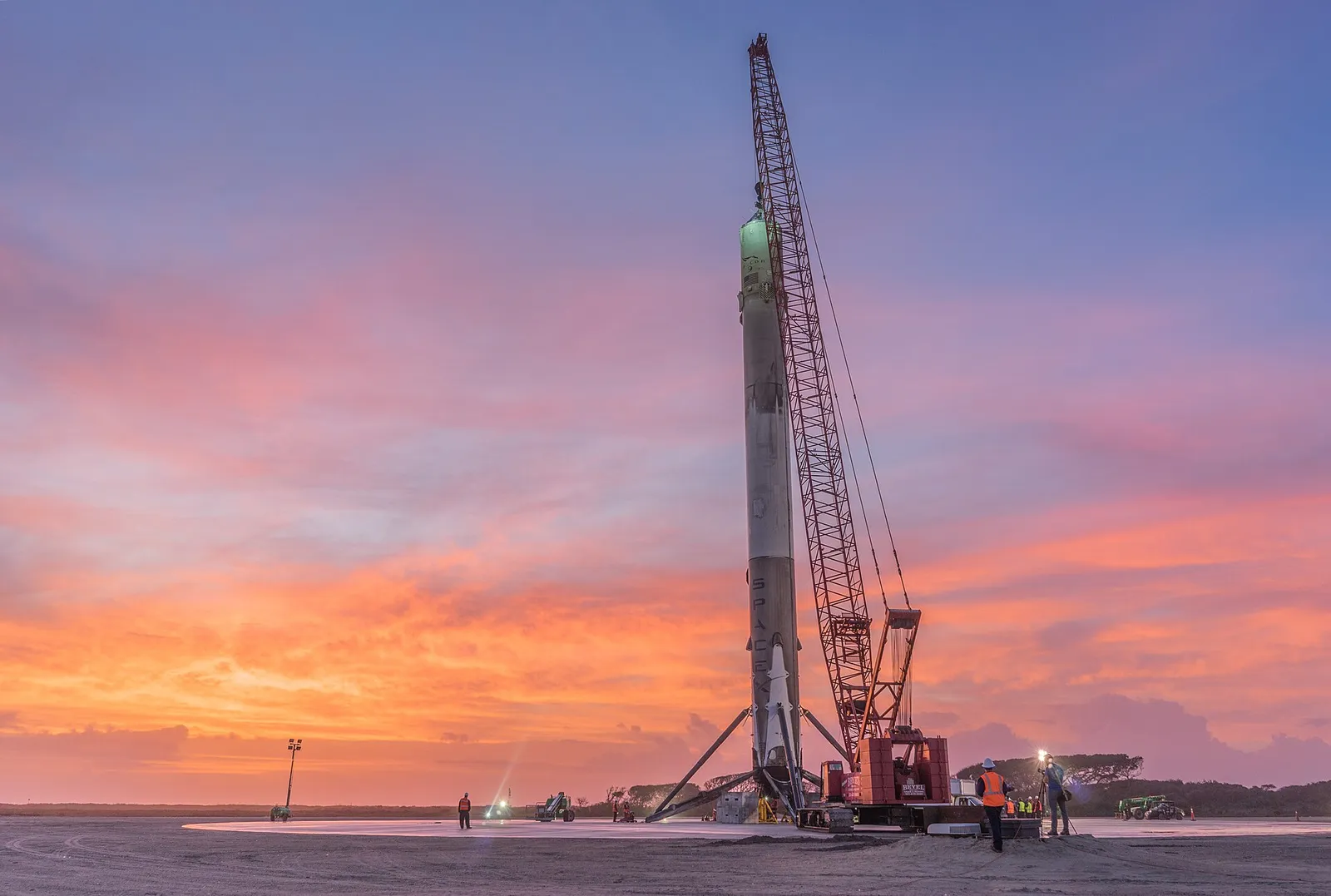 A SpaceX Falcon 9 first stage after landing at Landing Zone 1