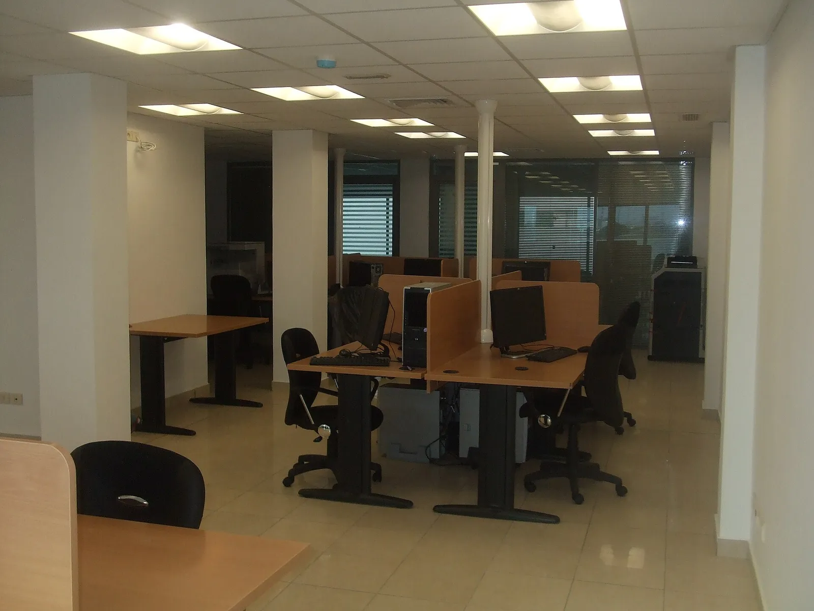Rows of desks in an open-plan office
