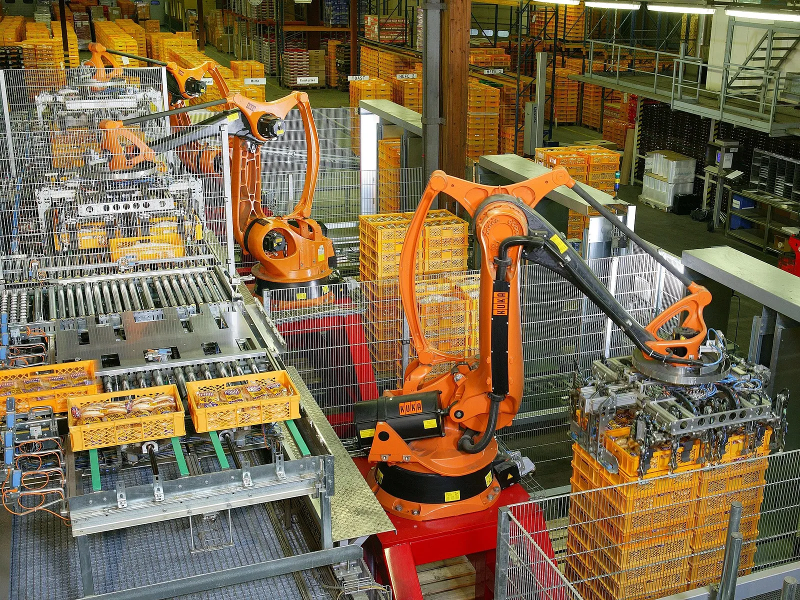 Industrial robots stacking goods on a factory production line
