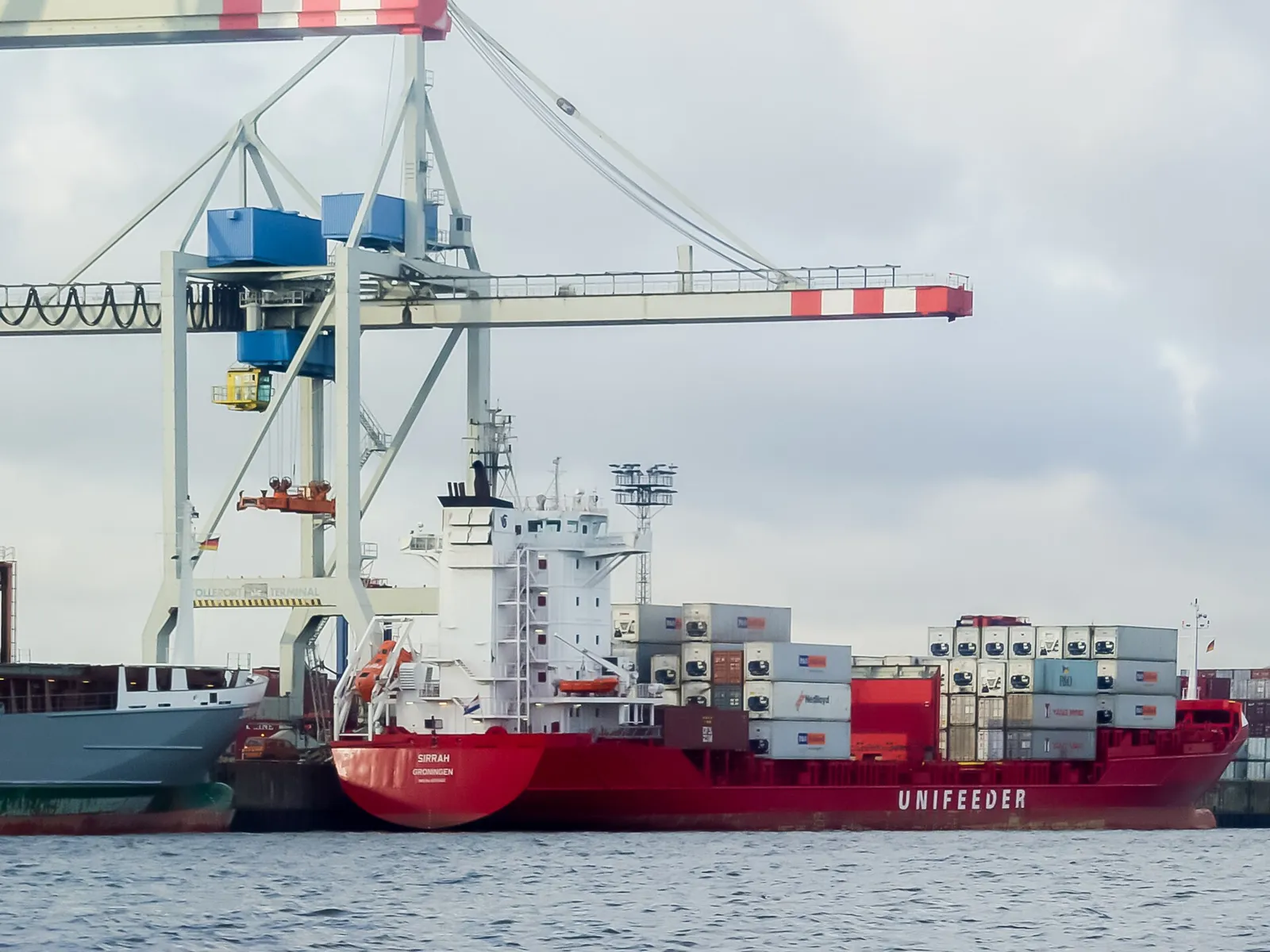 A container ship at a port terminal