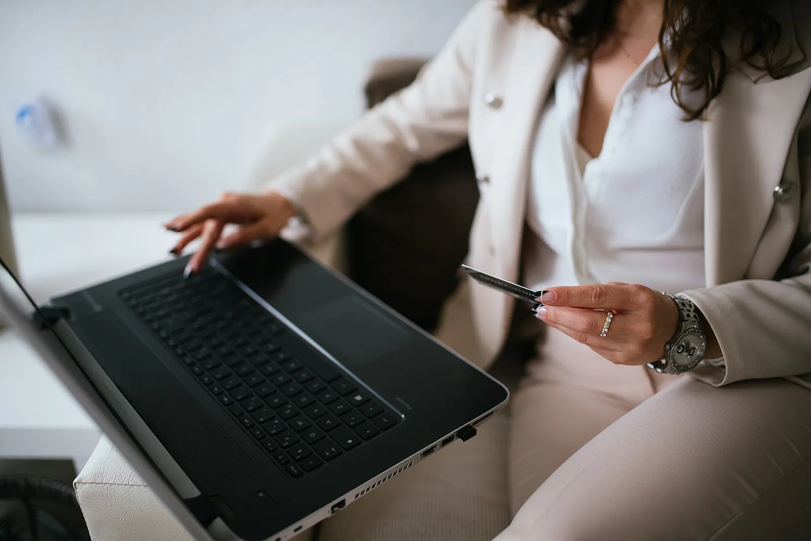 A shopper browses an online store from a home workspace