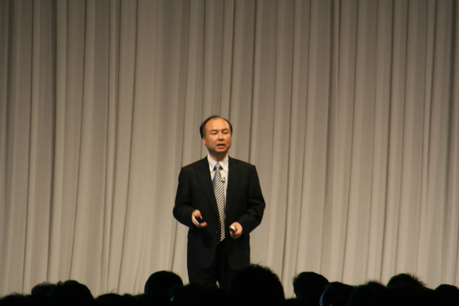 SoftBank founder and CEO Masayoshi Son speaking on stage