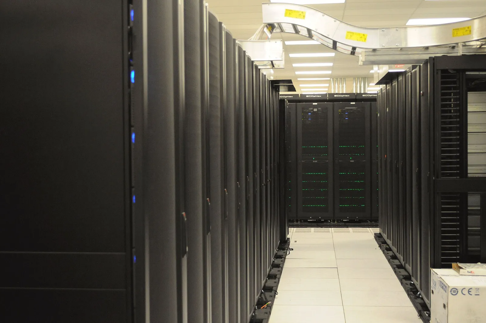 Rows of server racks in a data center