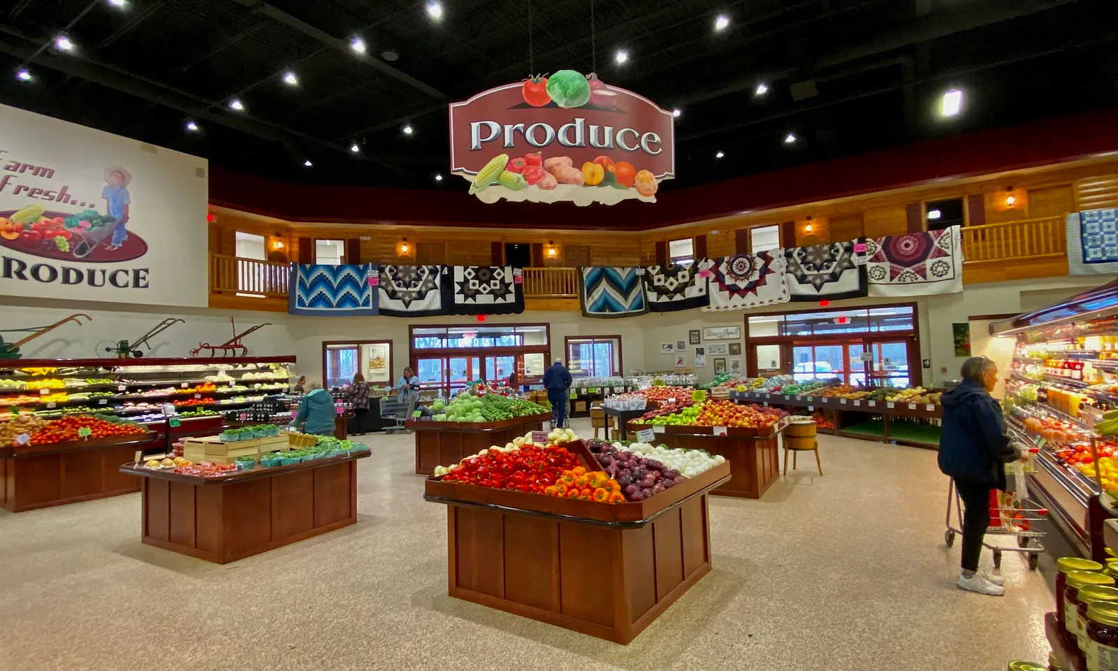 The produce and packaged-goods aisles of a supermarket