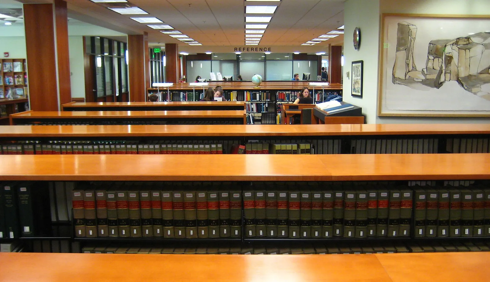 Rows of books on library shelves