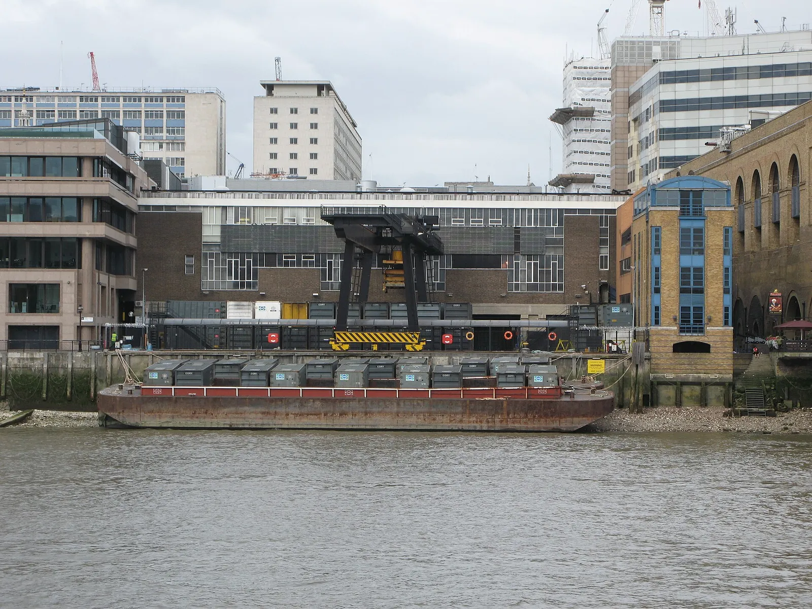 Shipping containers being unloaded