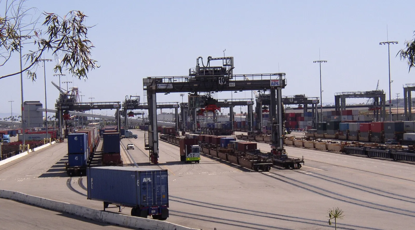 Shipping containers being transferred at a port