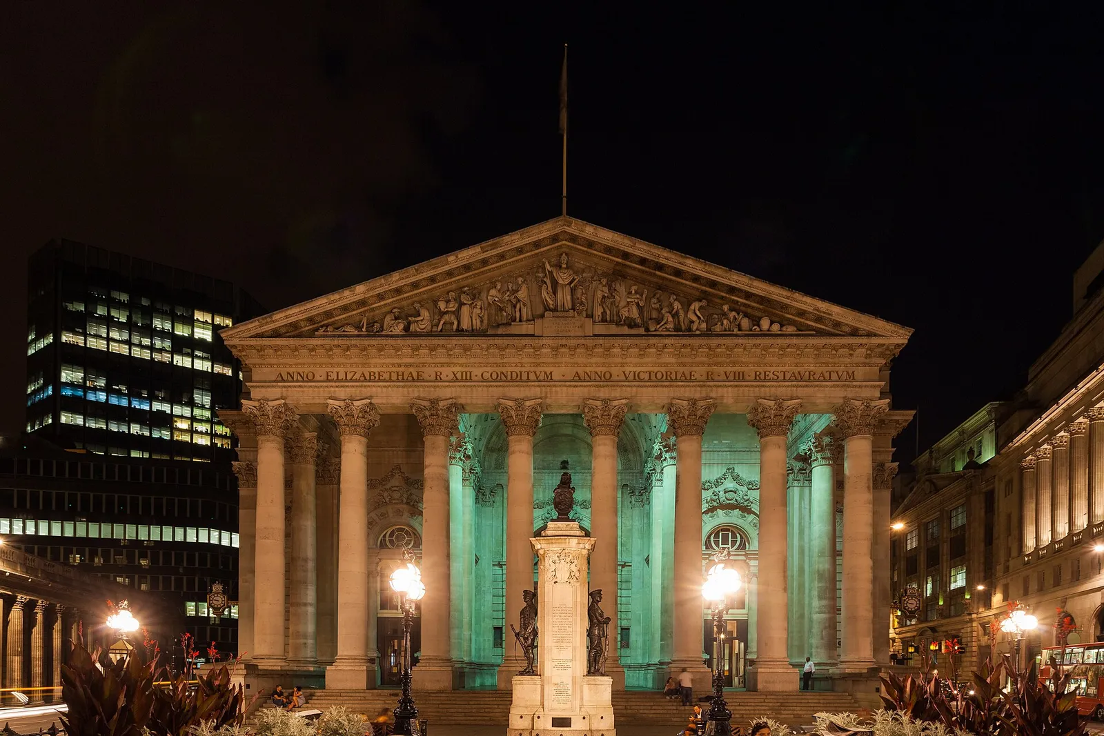 The Royal Exchange building in the City of London, lit at night