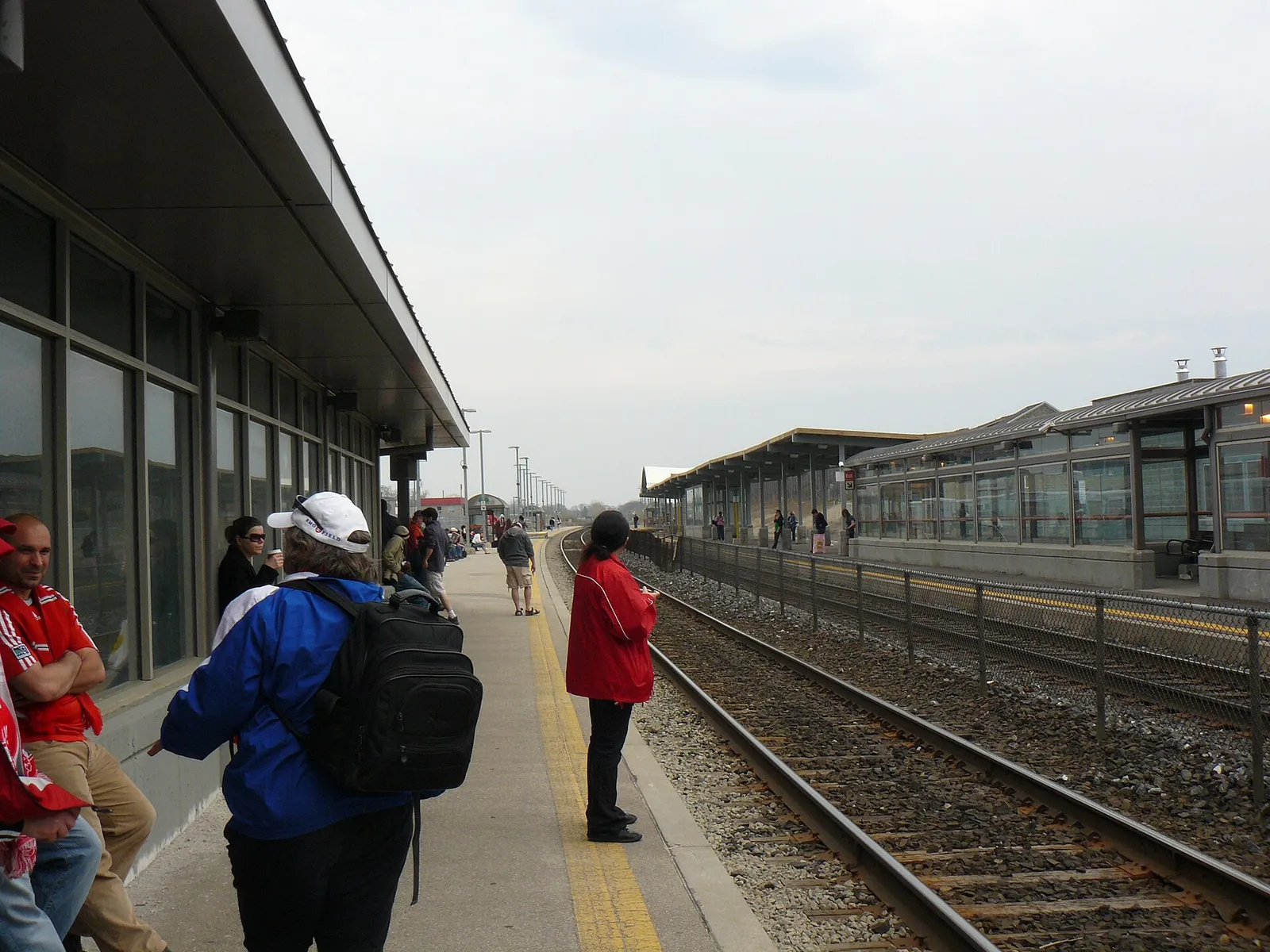 Commuters waiting on a city transit platform